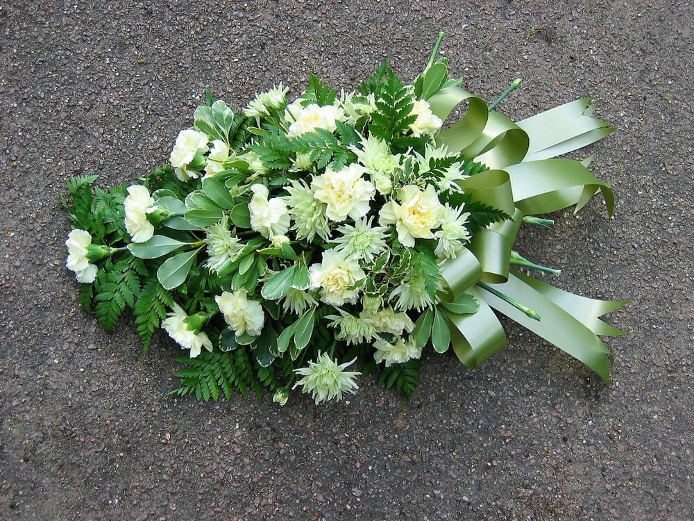 2.  Spray with cream Carnations and green Chrysanthemums