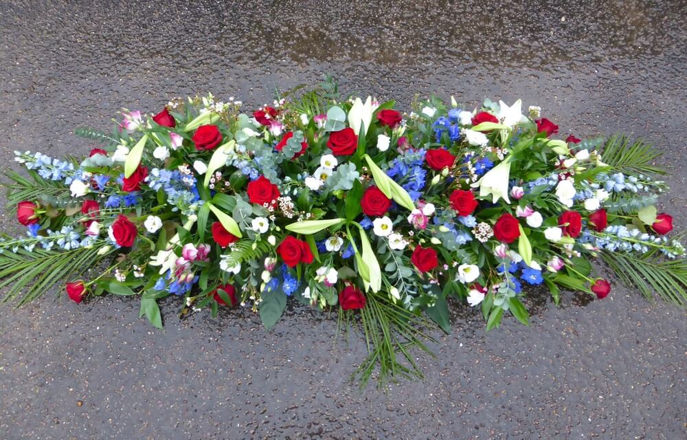 12. Full Coffin Spray of Lily’s, Roses, Lisianthus and Delphinium’s