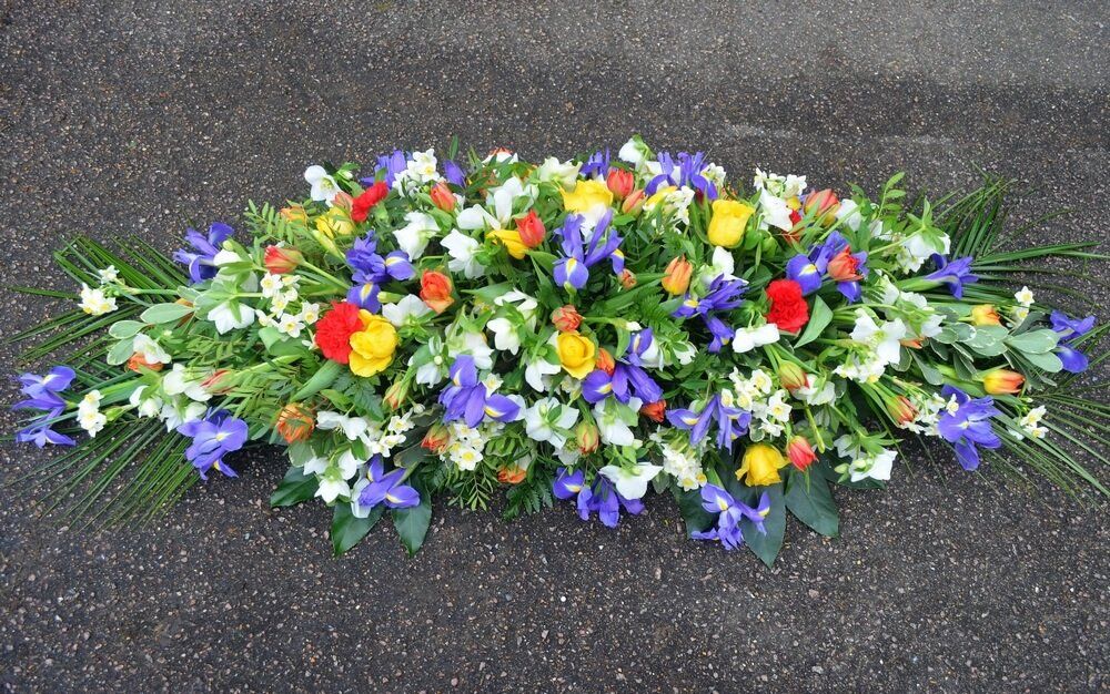 11. Spring flower Spray of Iris, Tulips, Narcissus, Roses and Hellebores.