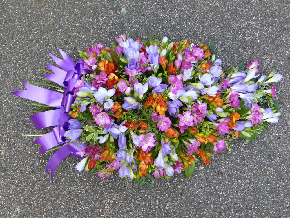 4.  Spray of all Freesias, ribbon end to match