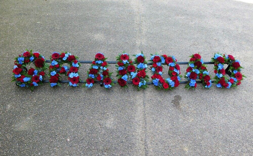 33. GRANDAD with Blue Hydrangea and burgundy Germini and Dianthus, in West Ham colours