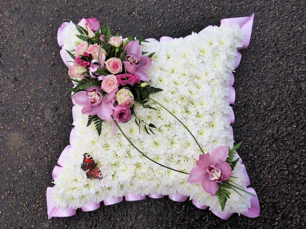 15. 18” white Cushion with pink ribbon edge, pink Orchids and Rose Posy and Butterfly