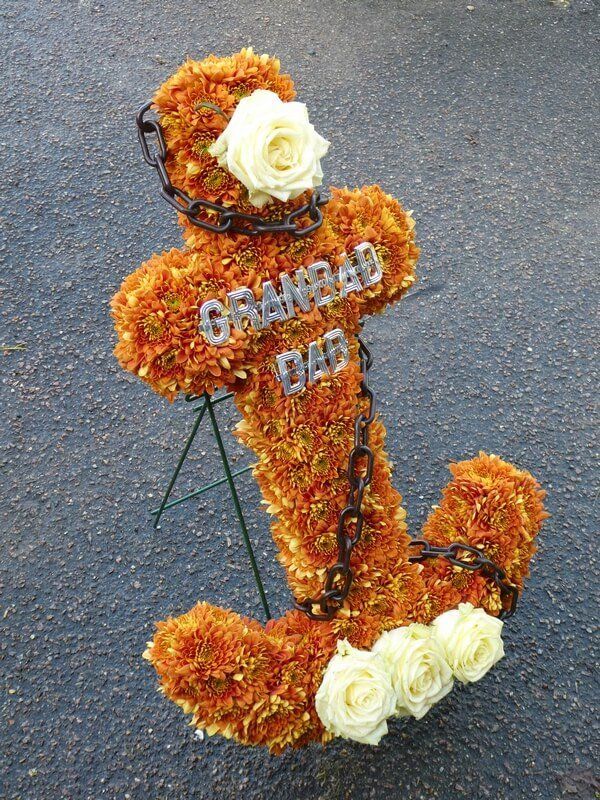 51. Rust coloured 2’ Anchor and chain on its own stand