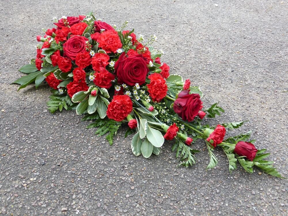 40. Red spray with Carnations and Roses