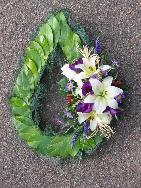 9. Teardrop Chaplet with Laurel Leaves and posy of white Lilys, Berries, purple Lisiathus and Veronicas
