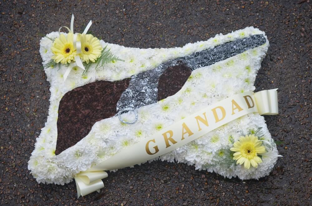 77. Large Pillow with hand crafted Shotgun