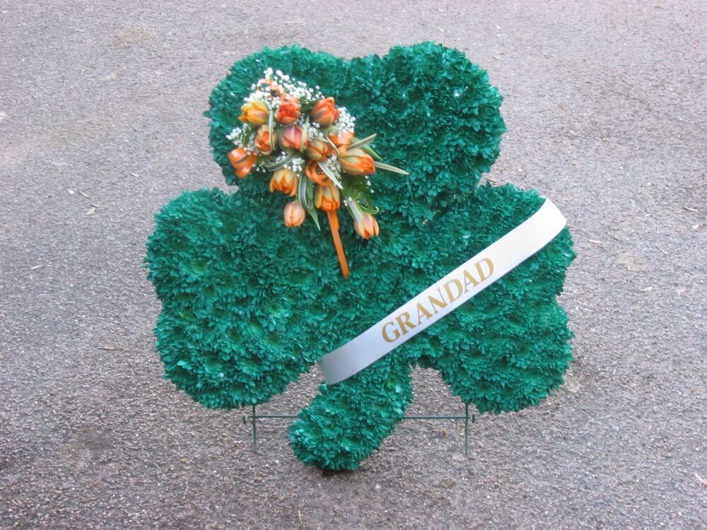 81.  Large Shamrock with ribbon sash and displayed on its own stand