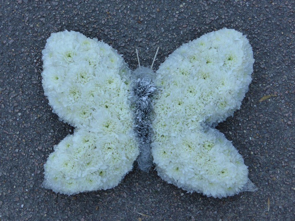 83.  Hand crafted small white and grey Moth