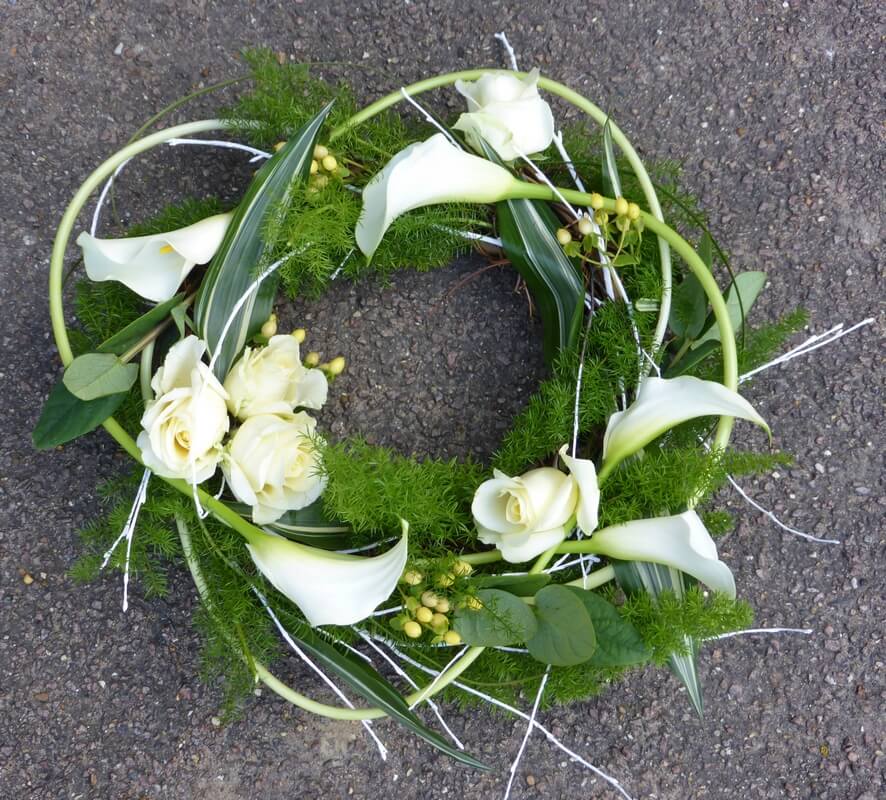 29.  12” Natural Willow ring with white Callas, Roses and berries