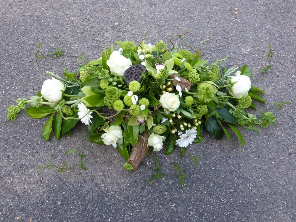 41. Woodland spray of Roses, Germini, Orchids, Berries, Mollucella, Guelder Rose, Bark, Jasmine and Lotus Pods