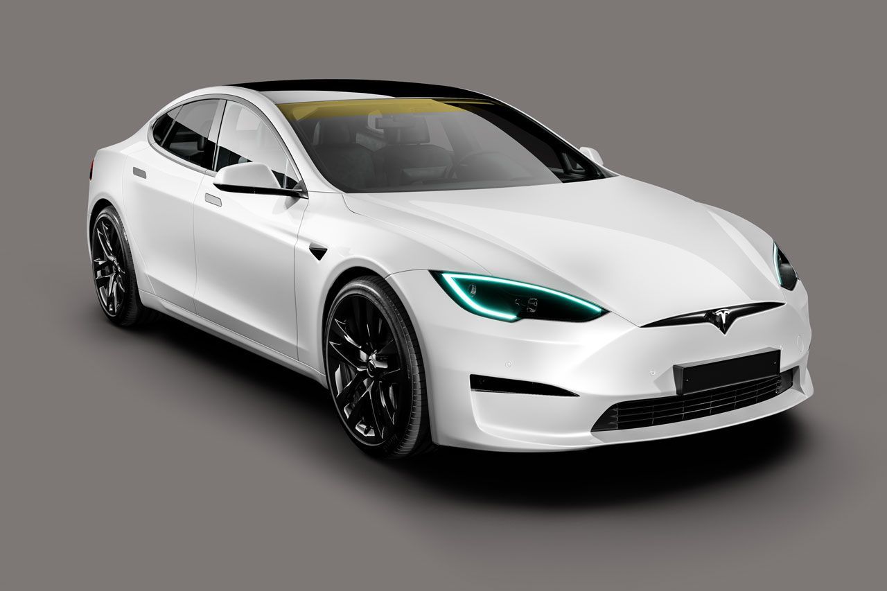 a white tesla model s with green lights on a gray background .