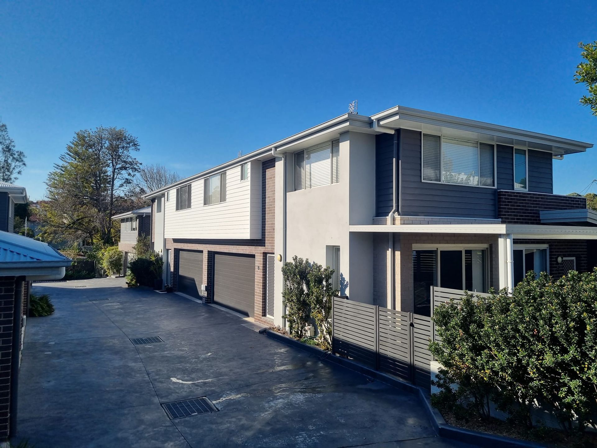 A Large House With a Lot of Windows and a Driveway in Front of It — All Clean Pressure Cleaning in Valentine, NSW