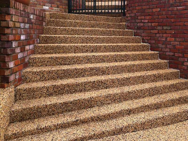 A Set of Stairs Leading Up to a Brick Wall — All Clean Pressure Cleaning in Valentine, NSW