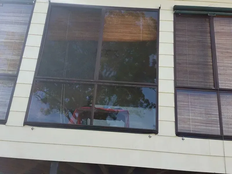 A Building With a Lot of Windows and Blinds on It — All Clean Pressure Cleaning in Valentine, NSW