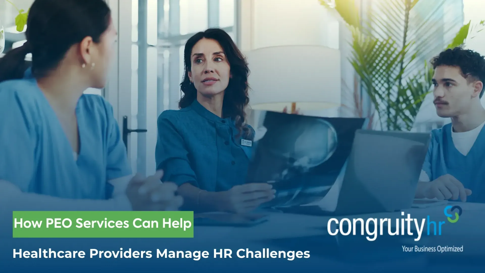 Three medical professionals reviewing an x-ray, discussing HR challenges.