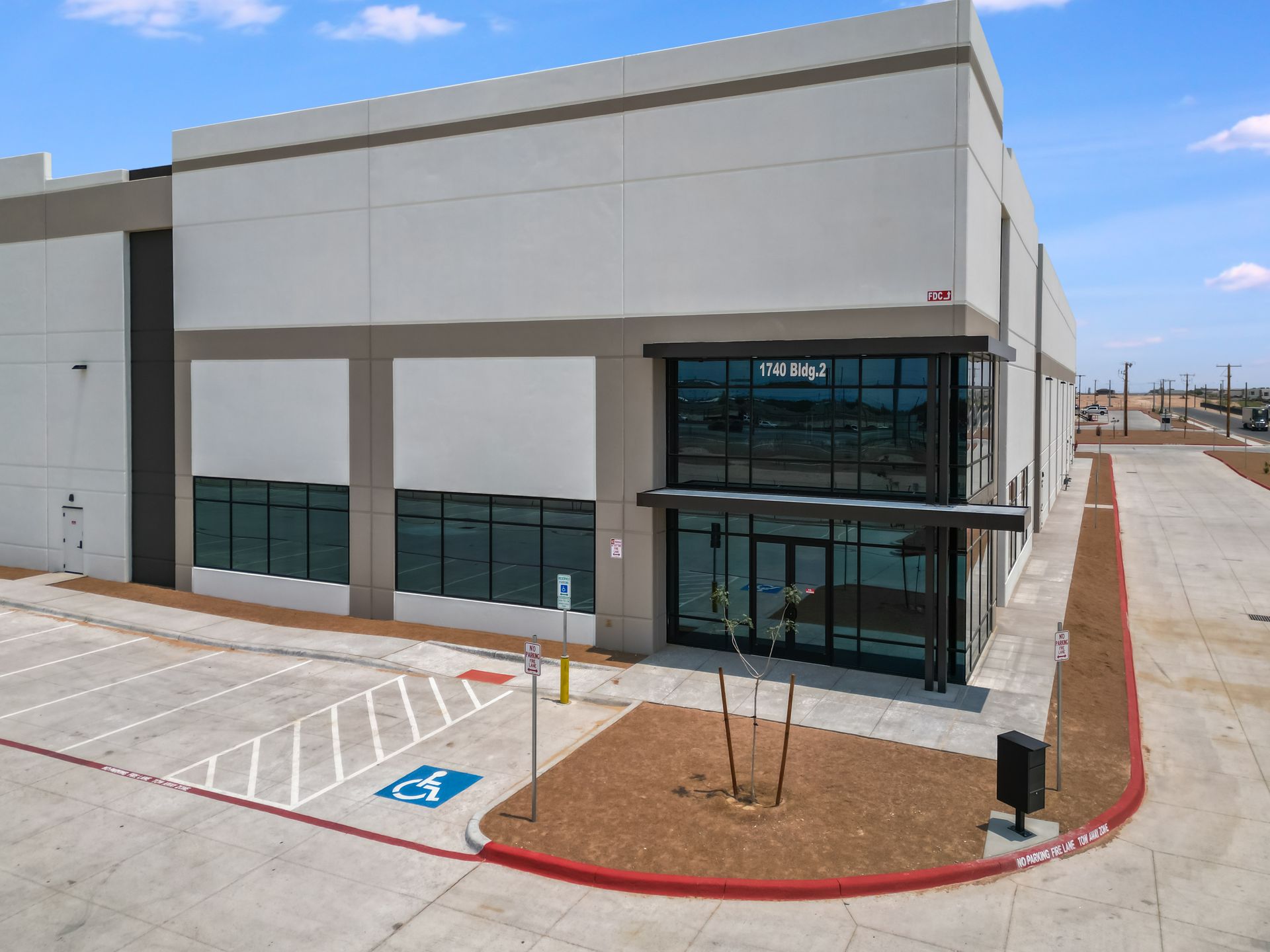 Aerial view of Joe Battle Business Park, a modern industrial facility in El Paso, Texas, with dock and ramp loading options for versatile logistics.