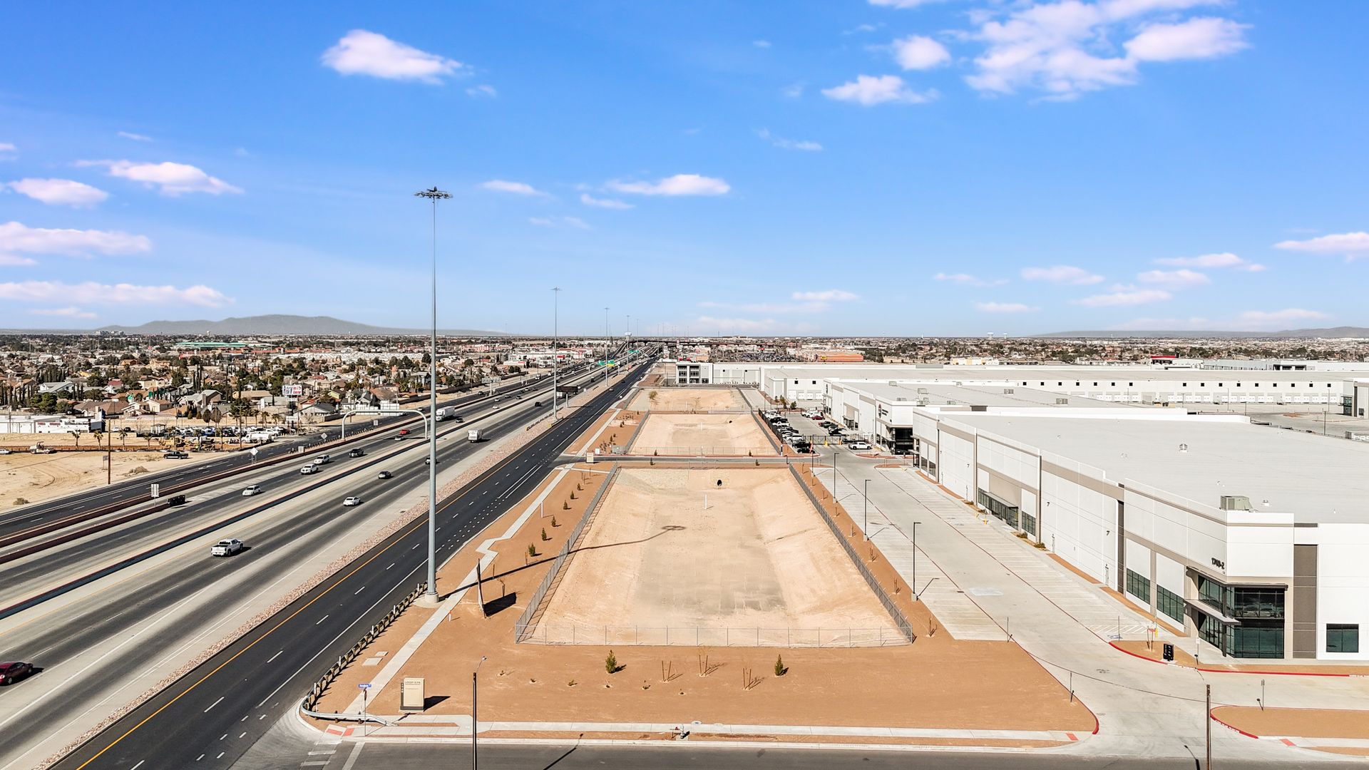 Drone photo highlighting lot boundaries and road access Loop 375 Joe Battle Blvd, El Paso Industrial Park
