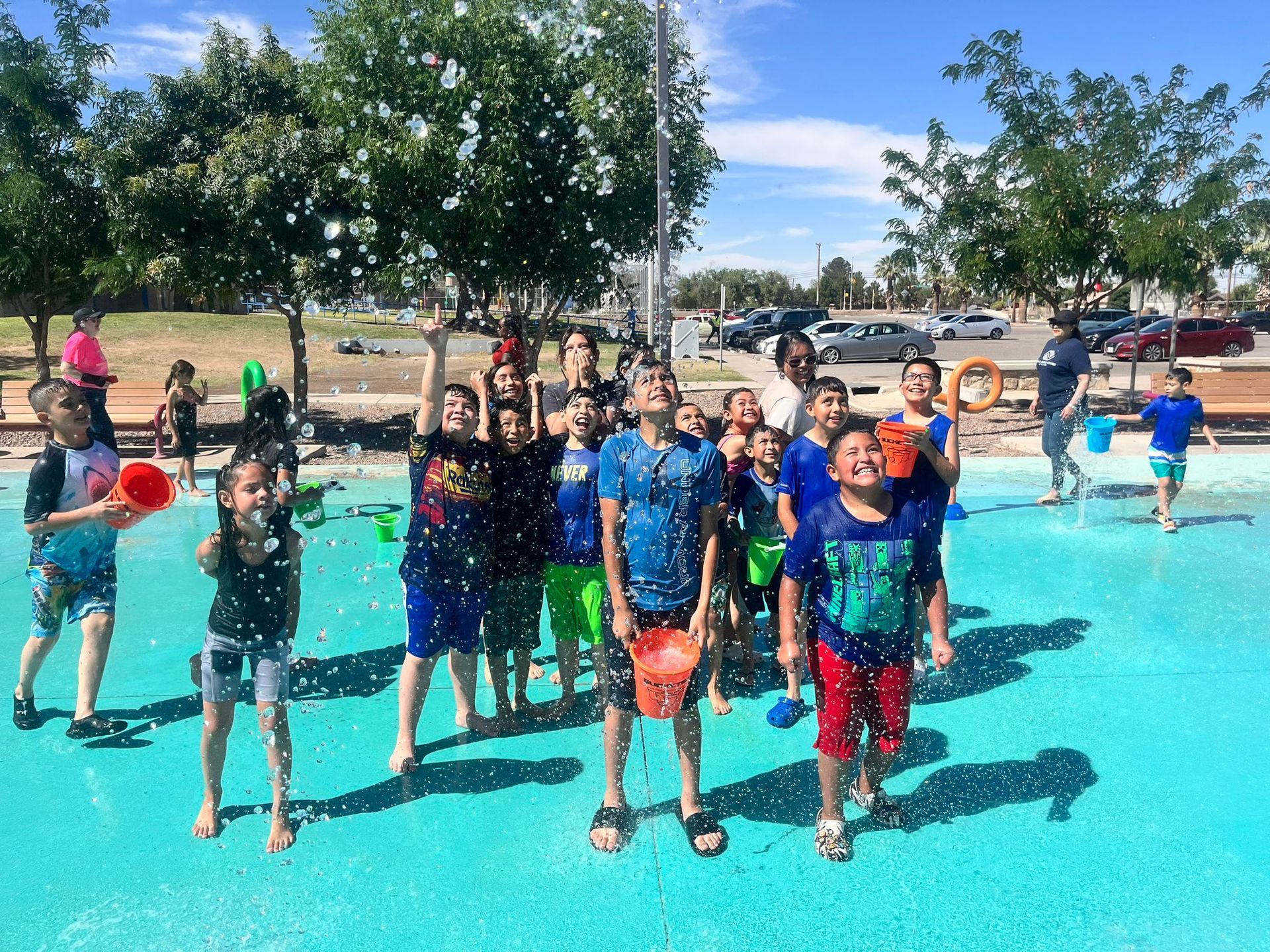 Kids enjoying a water splash pad during the summer program at Boys & Girls Club of El Paso.