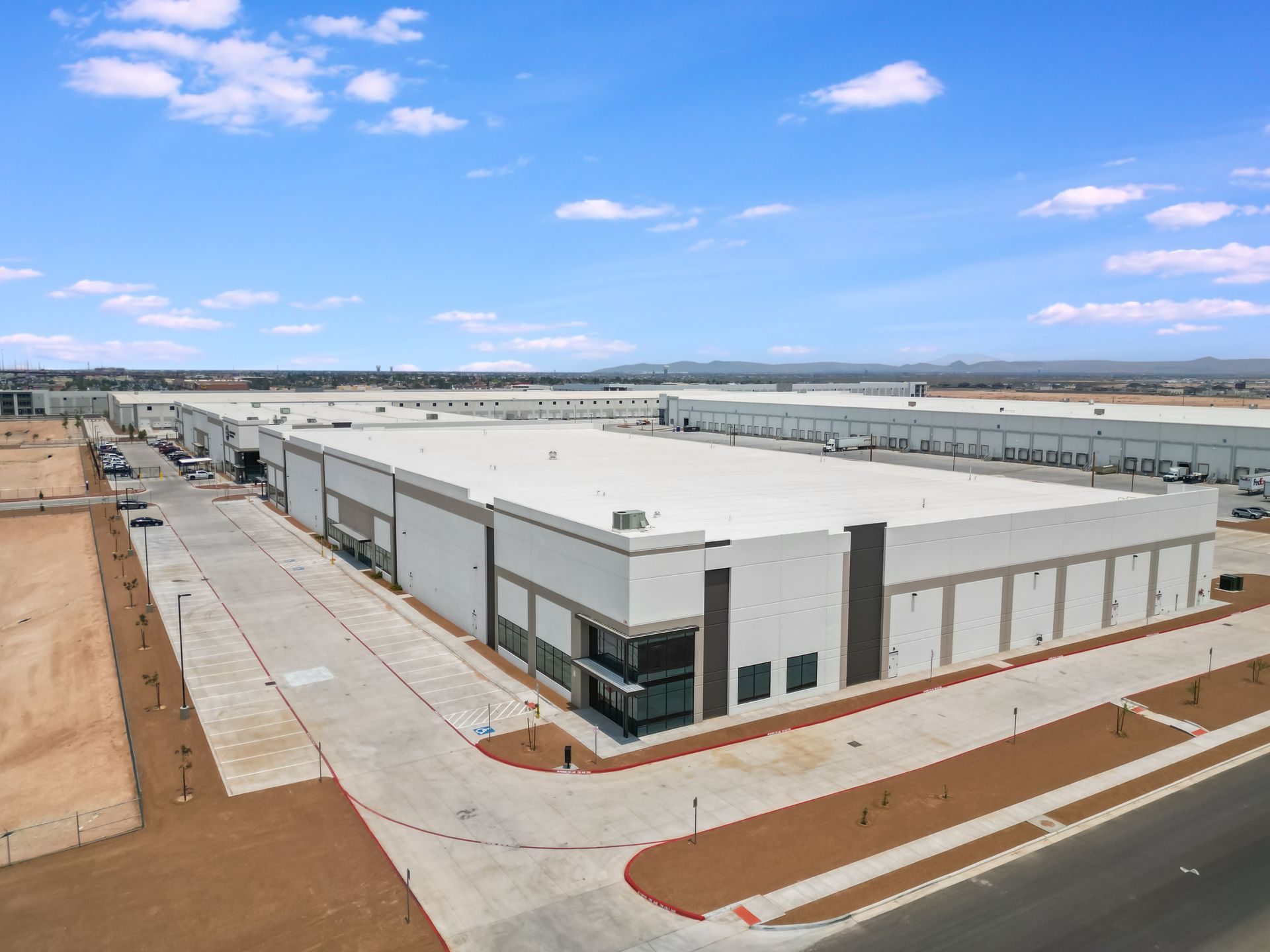 Drone view of Joe Battle Industrial Park in El Paso, highlighting the layout of buildings and infrastructure.