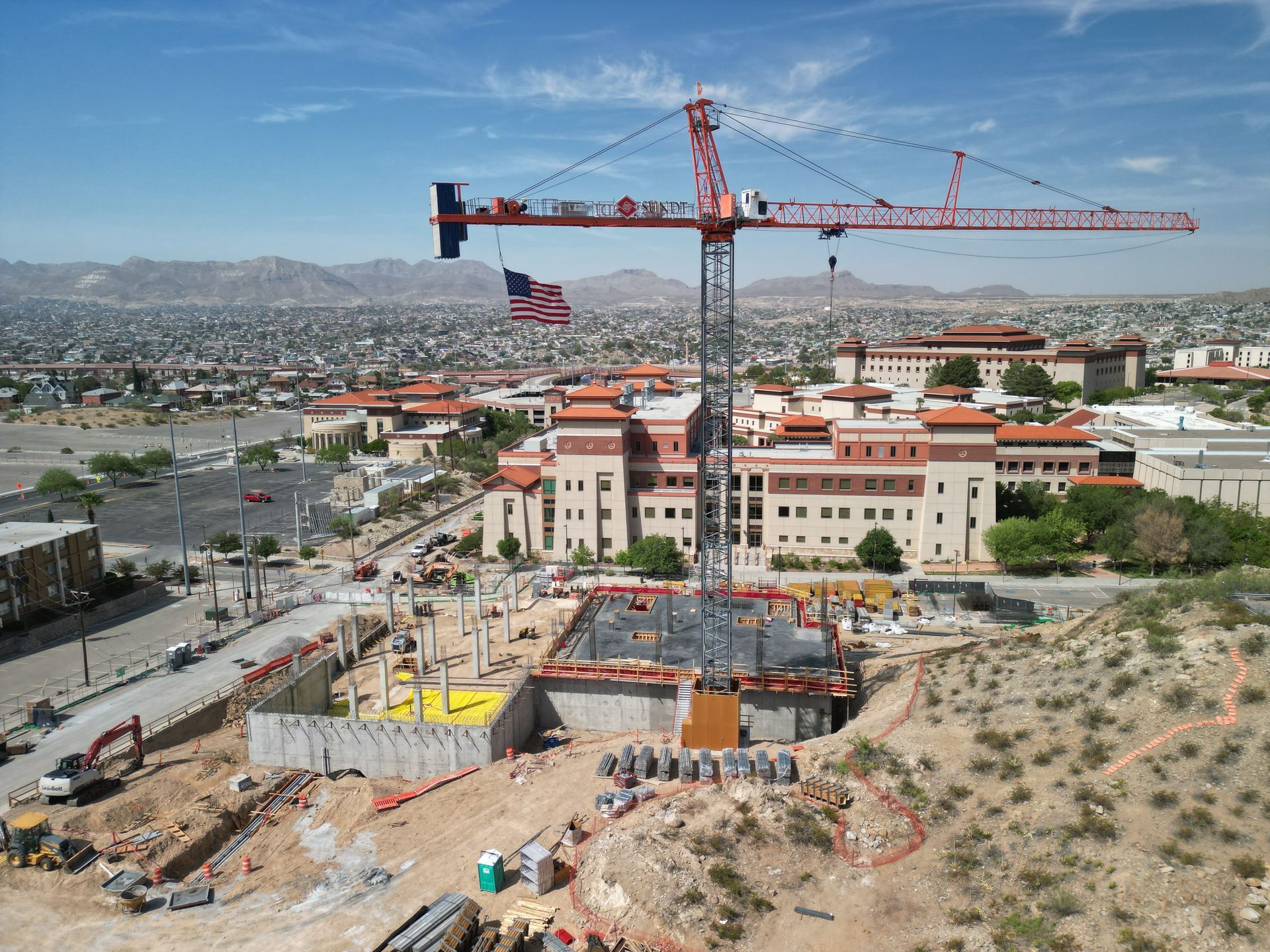 Aerial view of a construction site in El Paso, demonstrating site safety and compliance measures.
