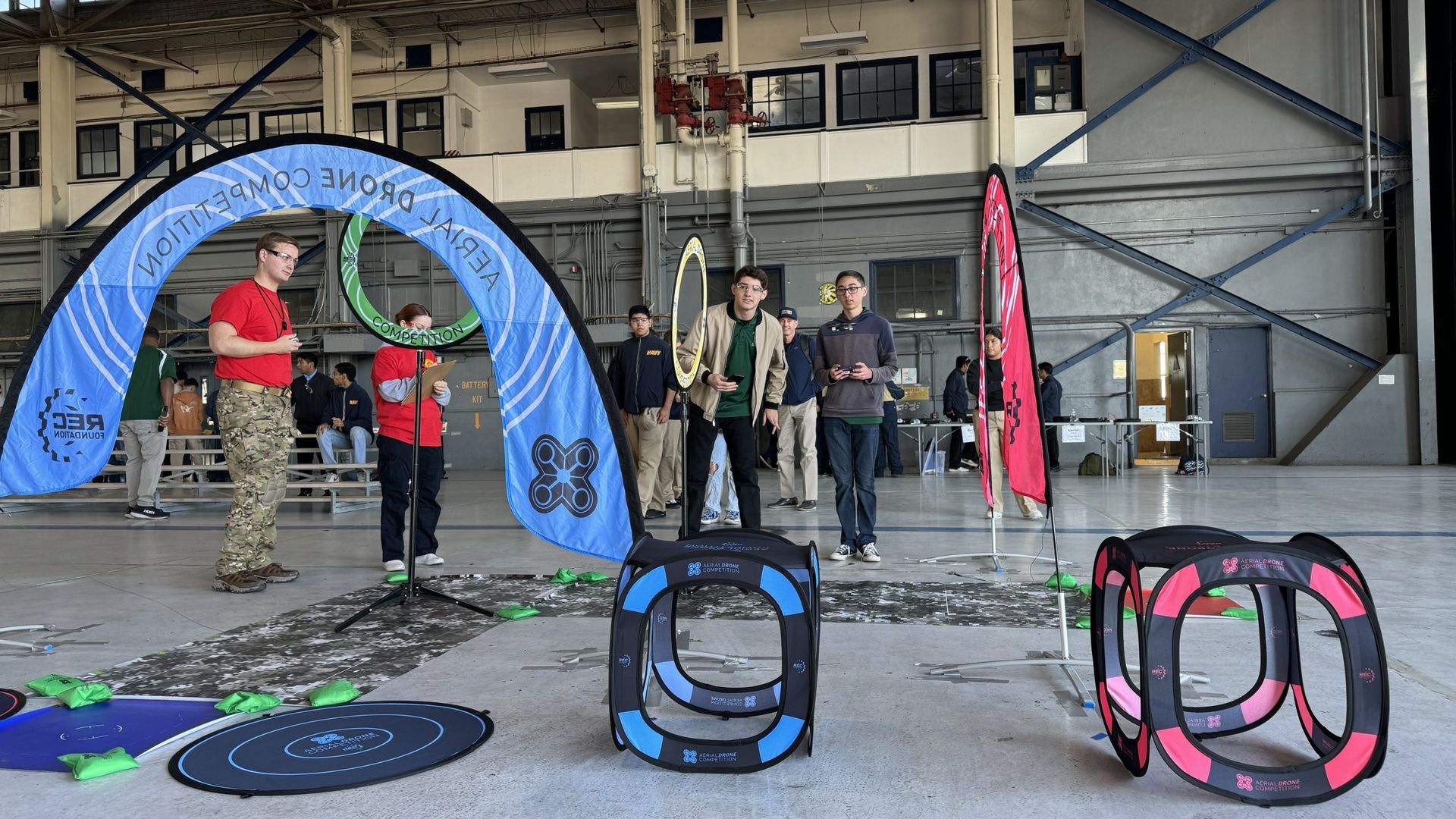 Students piloting drones outdoors in after-school drone program