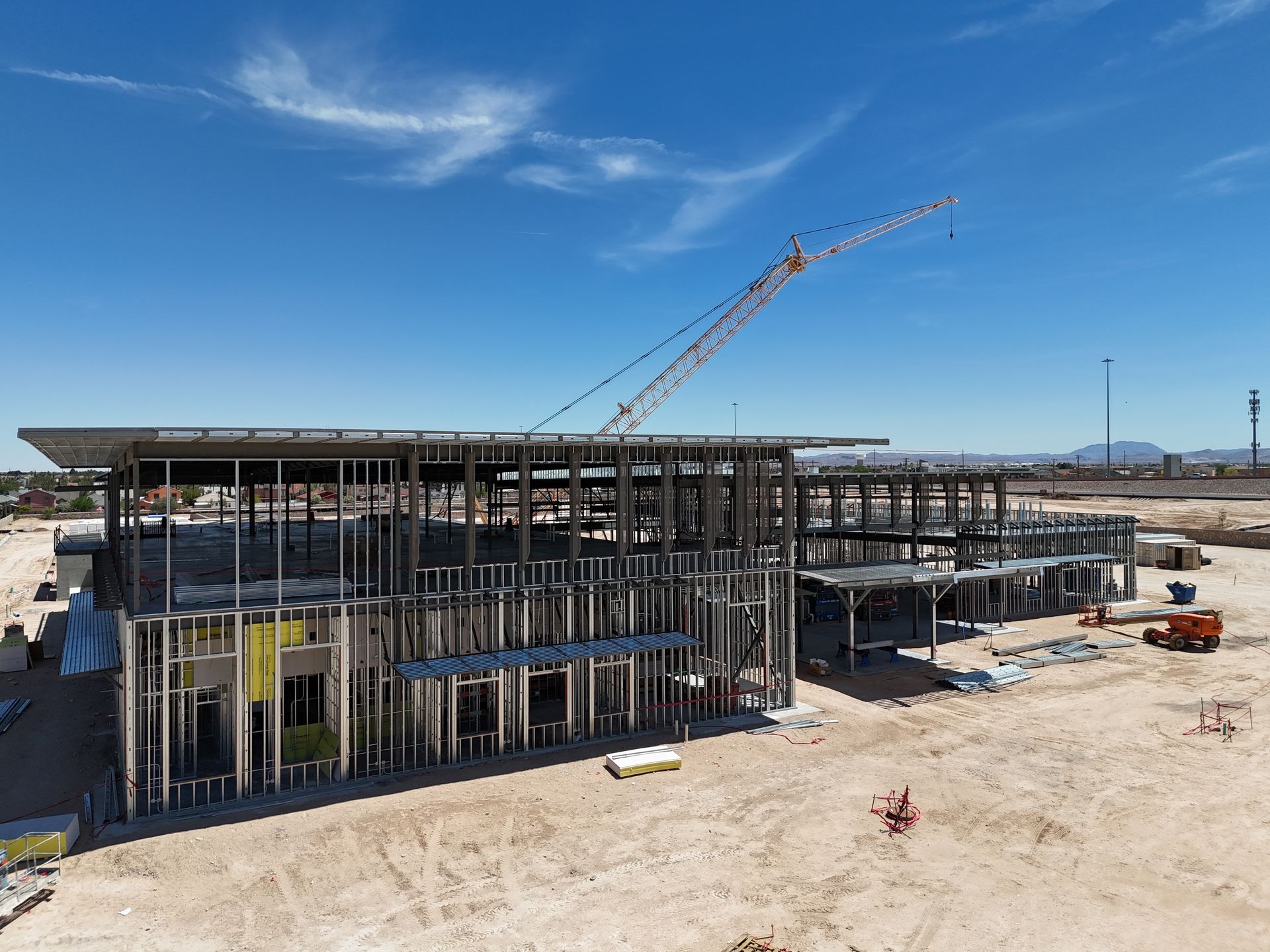 Drone Pilot inspecting how a construction project is progressing