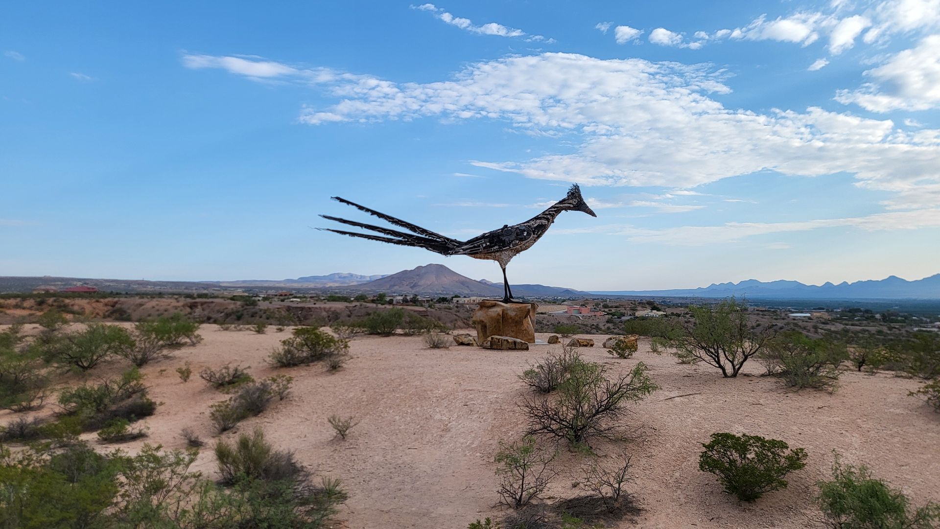 Las Cruces Roadrunner sculpture near Las Cruces, NM, crafted from recycled materials.
