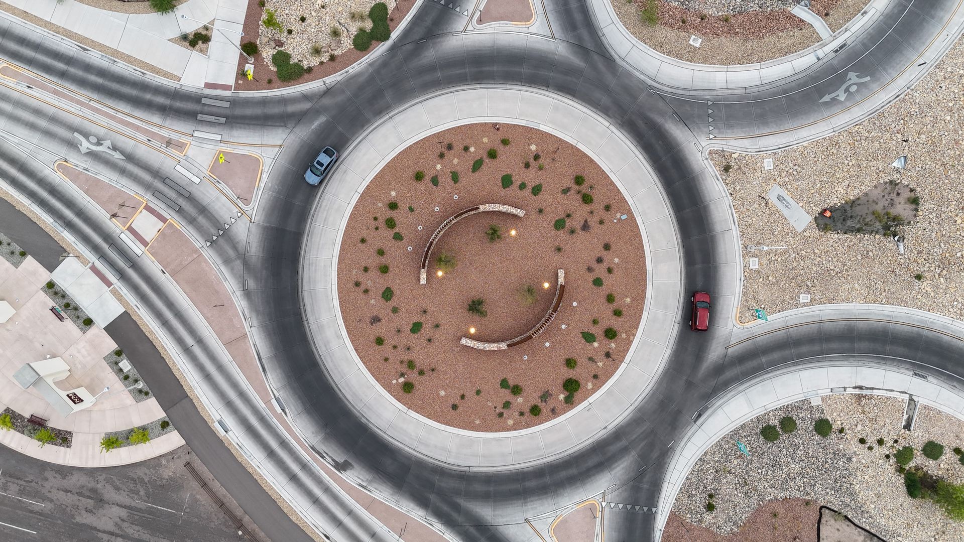 New Mexico State University Roundabout on I-25 in Las Cruces, NM, featuring NMSU branding and modern design. 