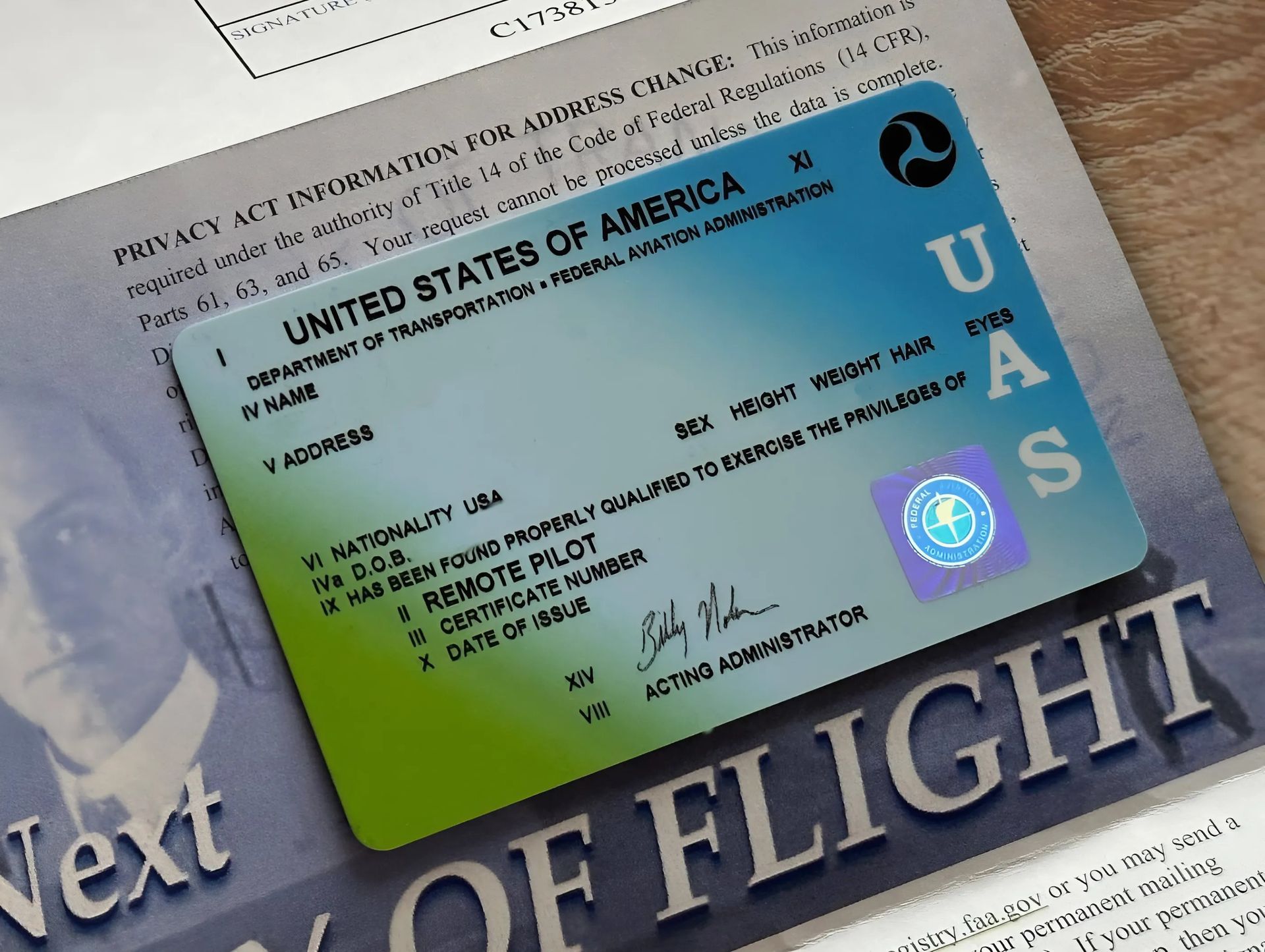 FAA Part 107 Certification card issued by the Department of Transportation for commercial drone operations.