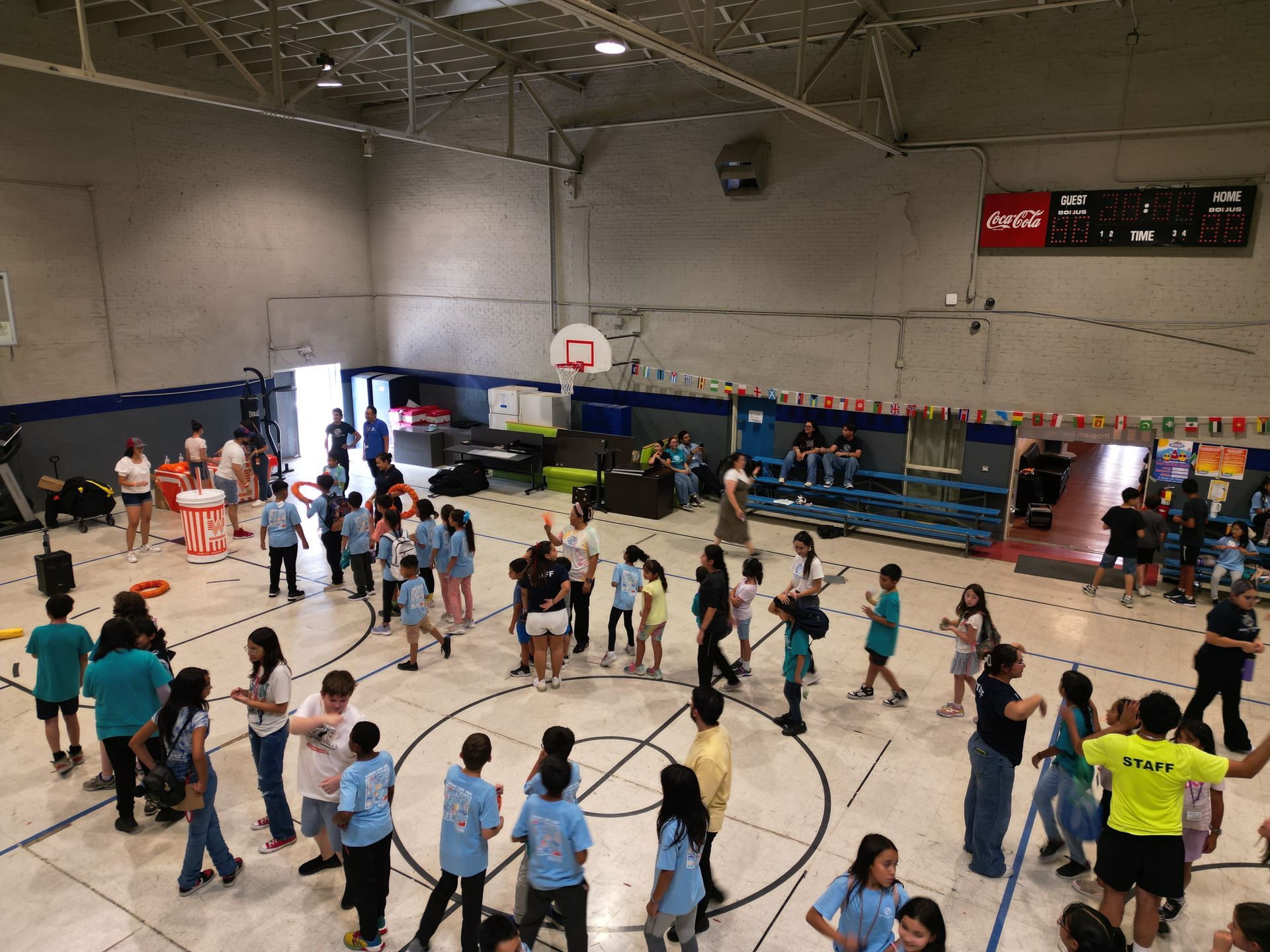 Boys & Girls Club members engaging in group exercises at a gym in El Paso, Texas.
