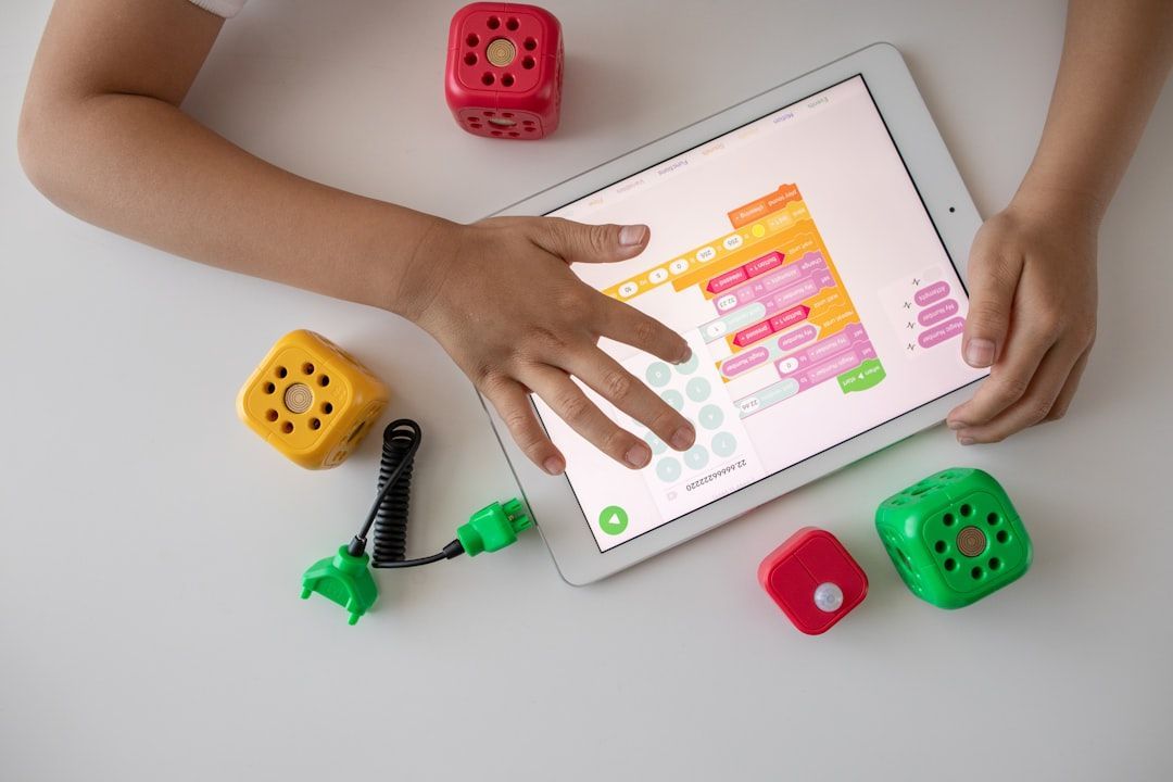 Building blocks and coding tablet on table for STEM activity at the El Paso Boys & Girls Club.