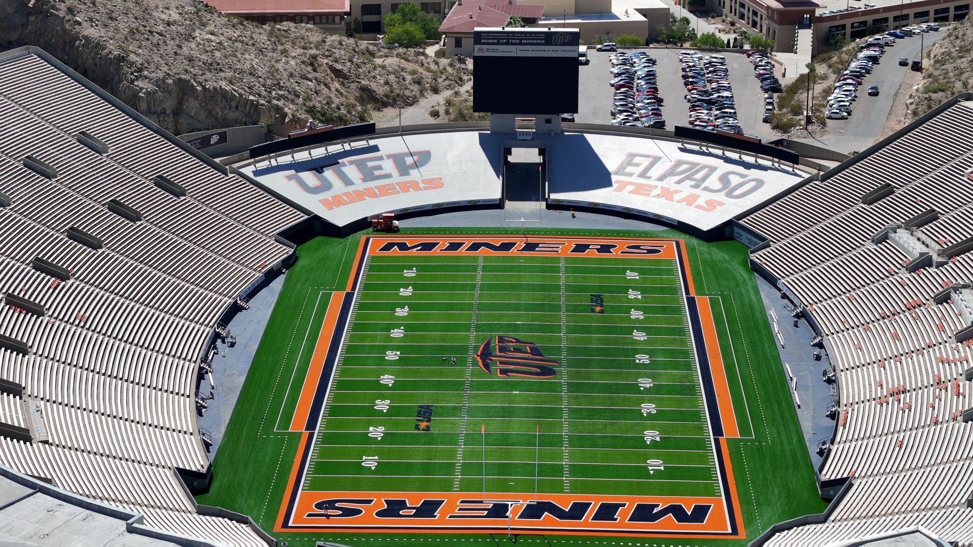 Sun Bowl Stadium, El Paso: An image displaying Sun Bowl Stadium in El Paso. The stadium's architecture, seating arrangements, field, and surrounding area may be visible. The image showcases the size, structure, and setting of the Sun Bowl Stadium, a renowned venue for sporting events and entertainment in El Paso.