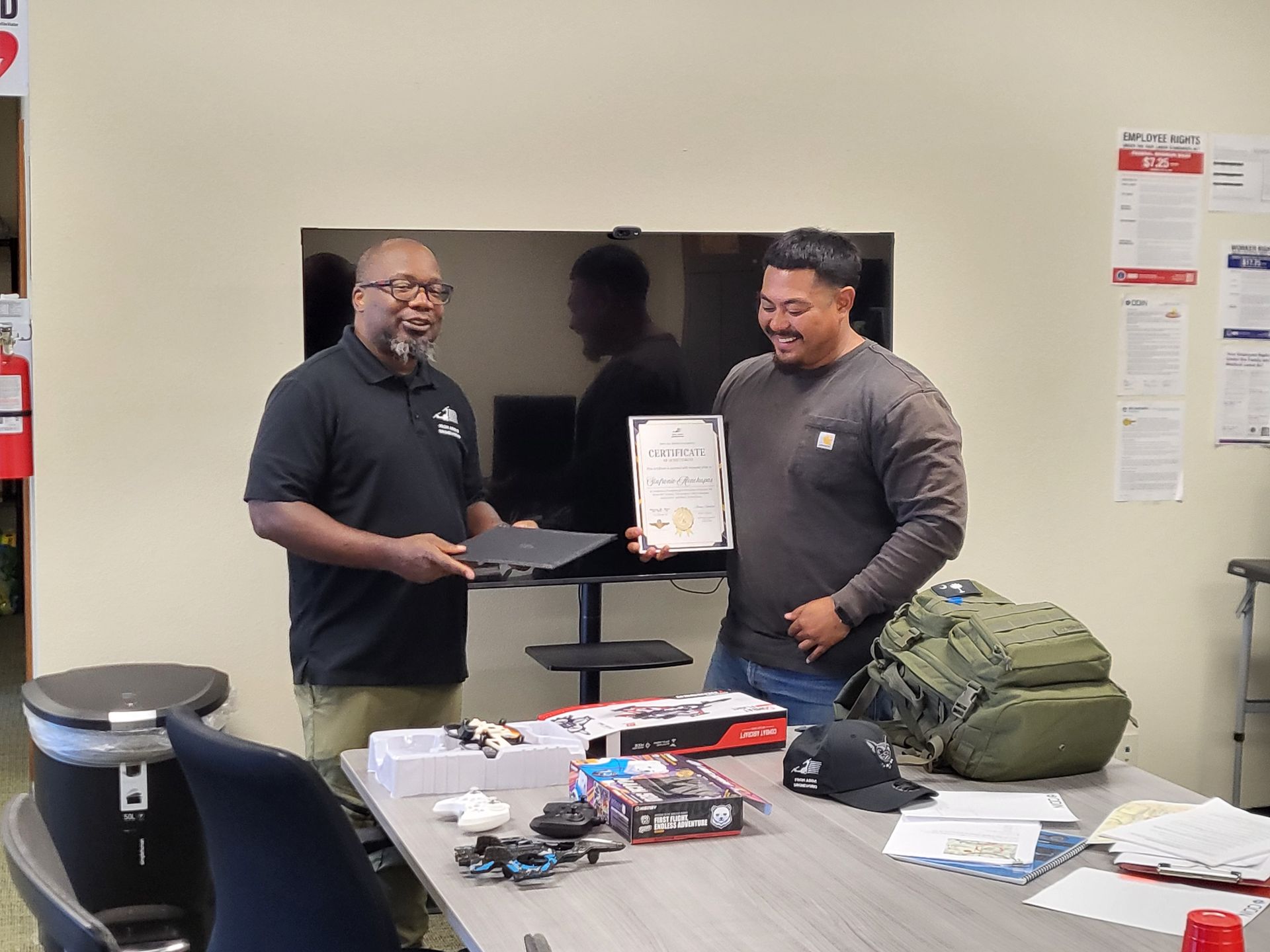 Class 2507 Team Dumptruck pilot receiving FAA Part 107 training certificate in El Paso