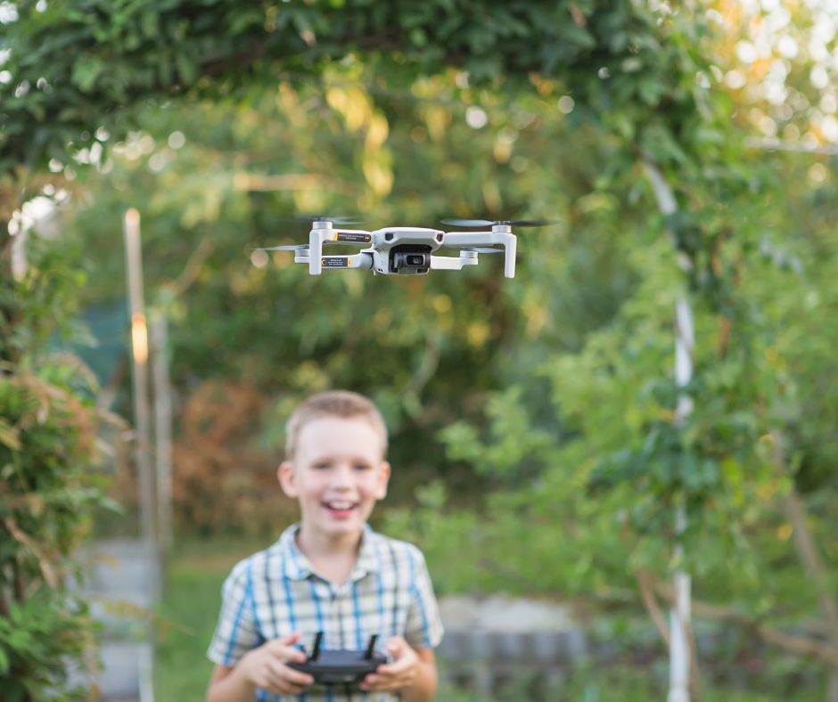 child flying a drone