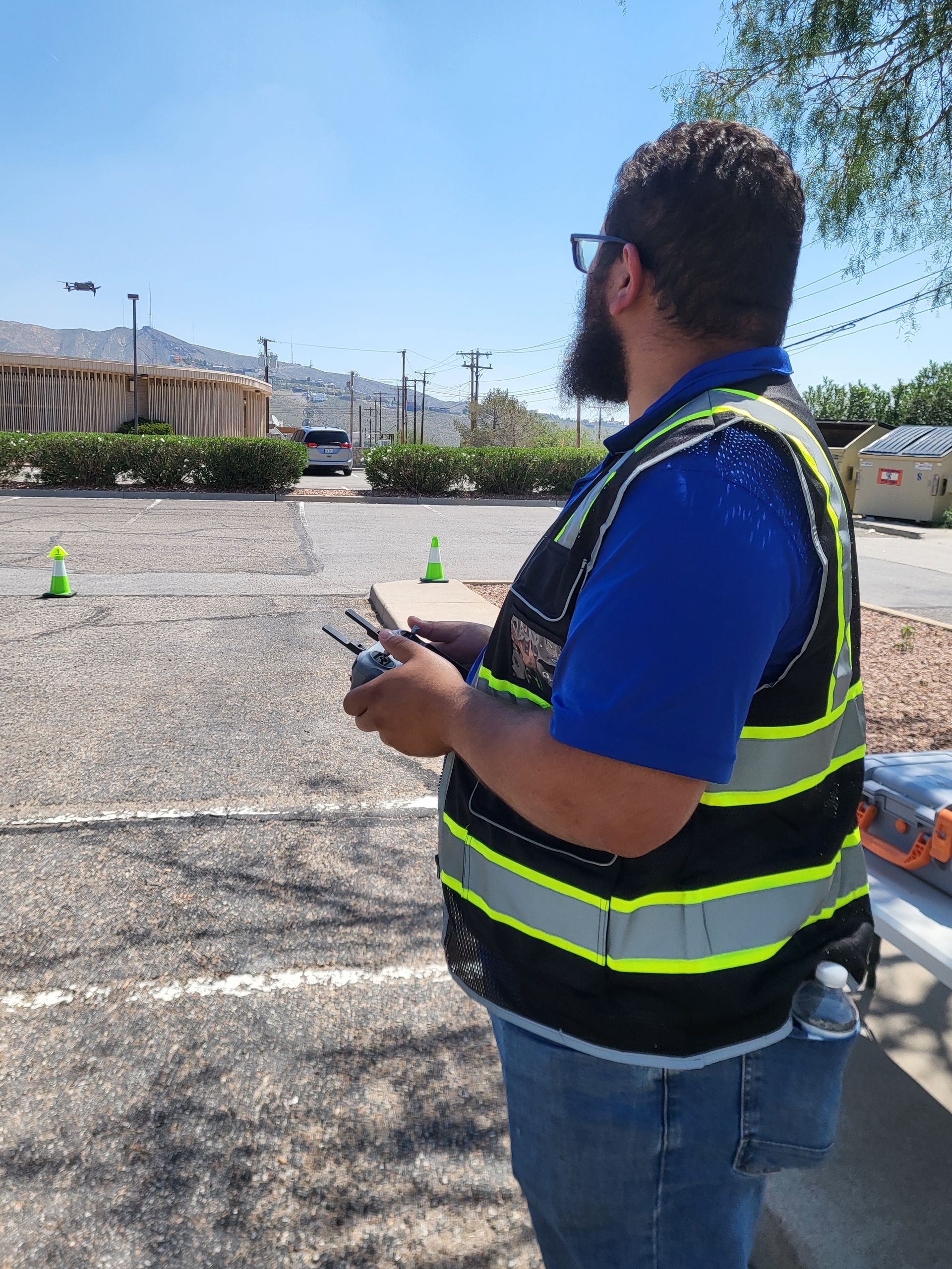 Drone pilot training class in El Paso with students learning FAA Part 107 rules and hands-on flight practice.