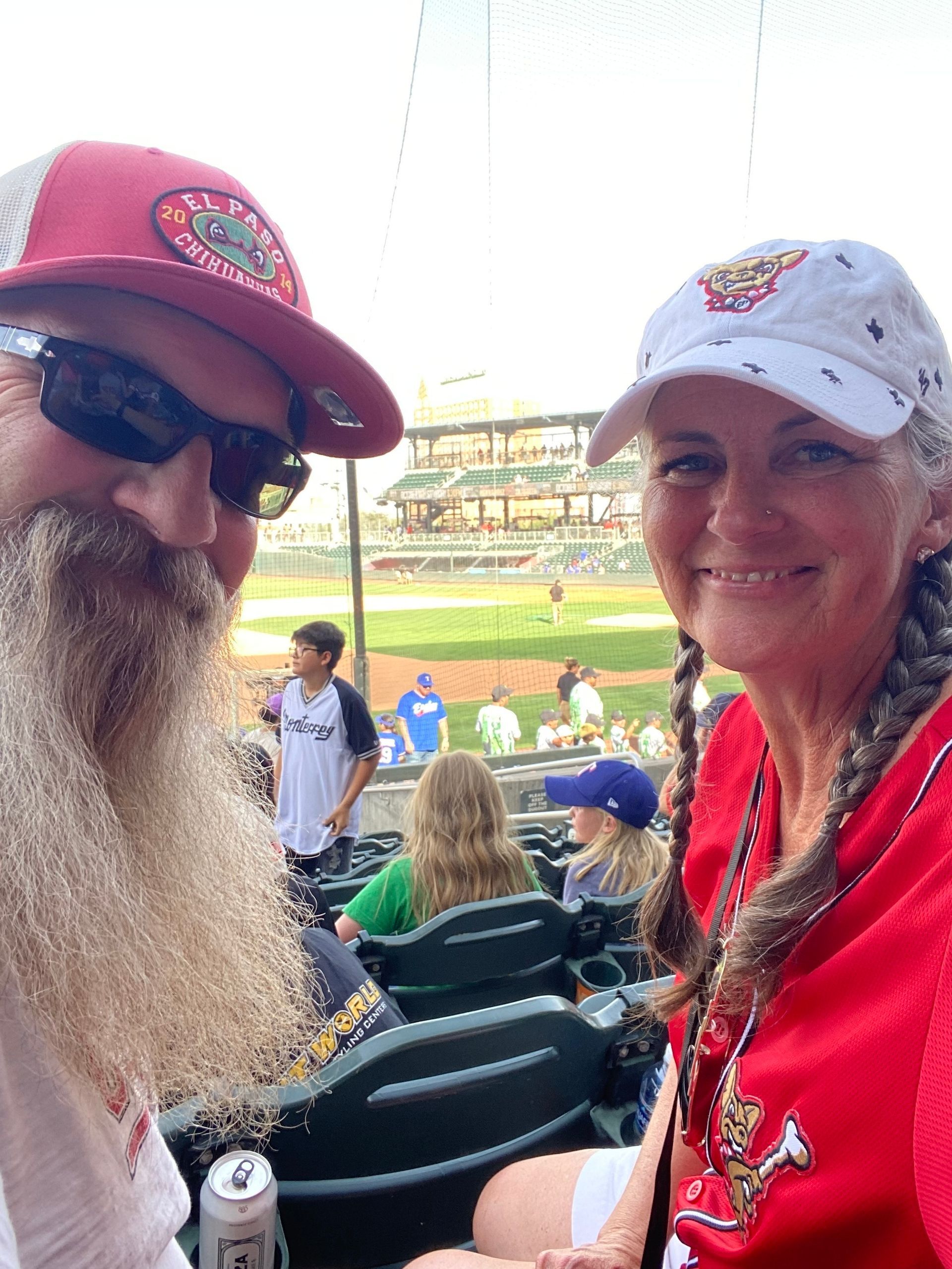 Veteran couple and family enjoying donated tickets to El Paso Chihuahuas game.