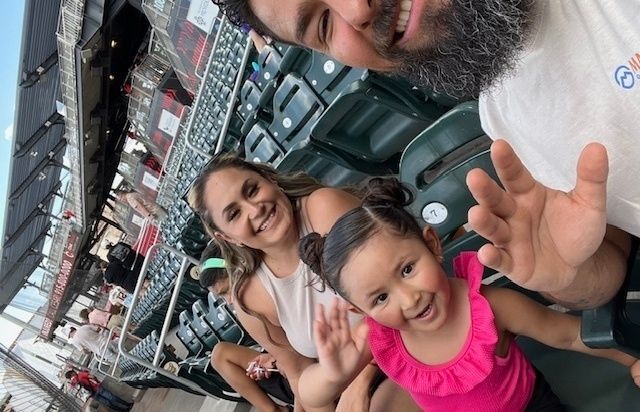 Veteran family with children enjoying El Paso Chihuahuas game through Vet Tix.