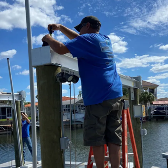 Boat lift installation being done by Faulkner Electric in Hernando Beach