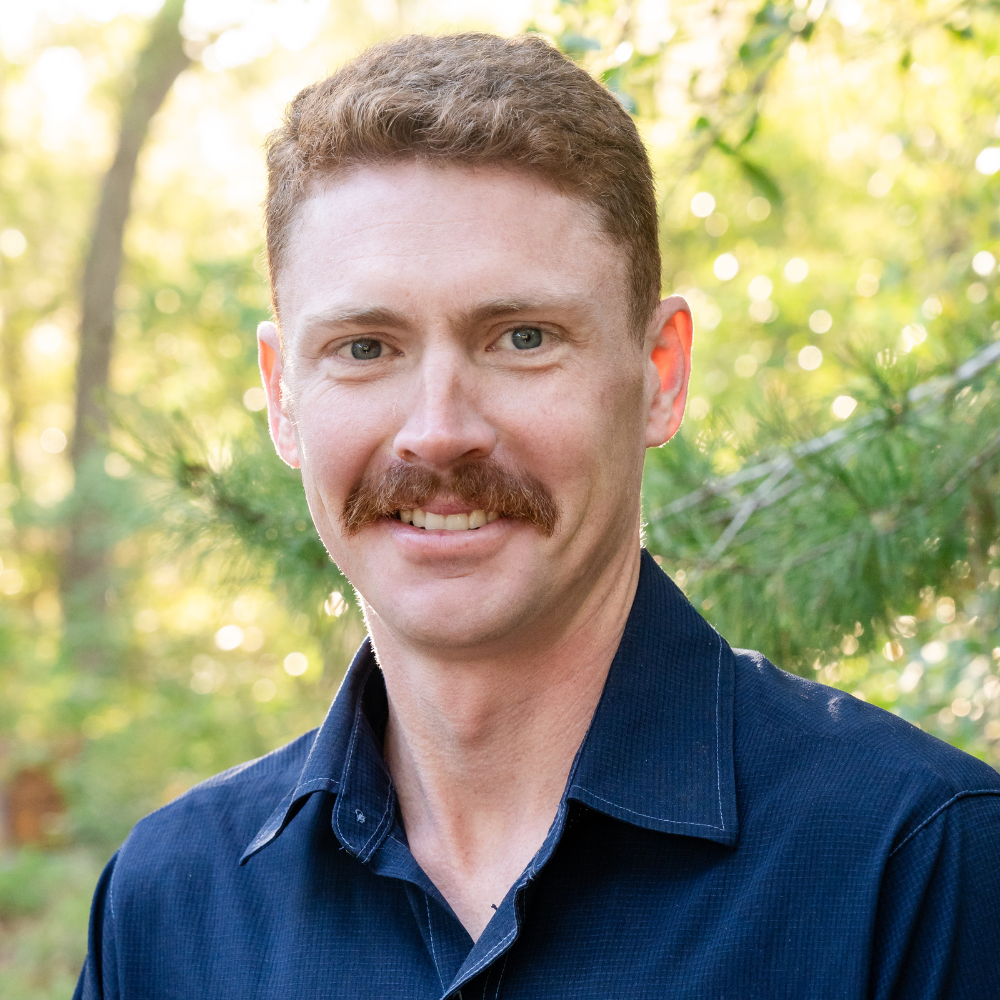 Faulkner Electric Project Coordinator, Kyle Lawrence smiling for his headshot