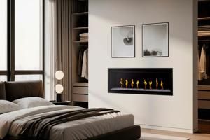 Modern bedroom with a dark bed, wall fireplace, and framed mirrors beside a window.