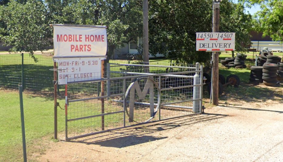 Sign for mobile home parts, metal gate with 