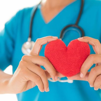 Doctor Hands Holding Red Heart — Omaha, NE — Arbor Heights Family Medicine