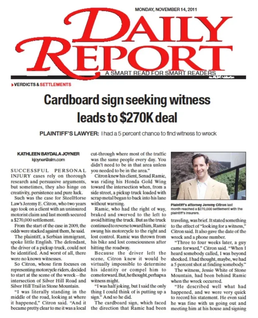 A daily report article about a cardboard sign seeking witness