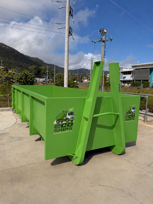 Bright Green Construction Dumpster on a Concrete Road — Eco Skips In Midge Point, QLD