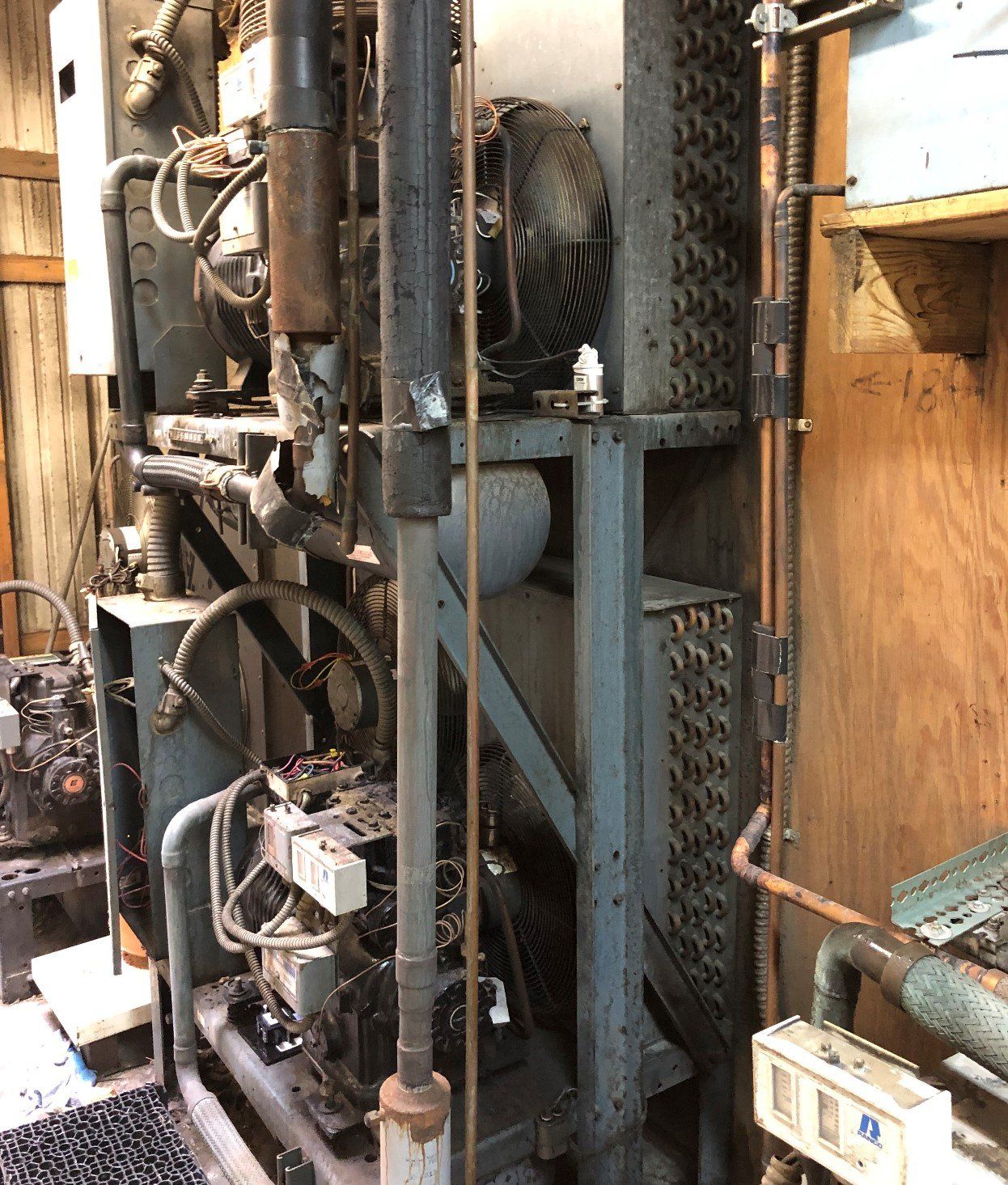 Technician Repairing Gas Furnace — Lexington, KY — High Vac Services!