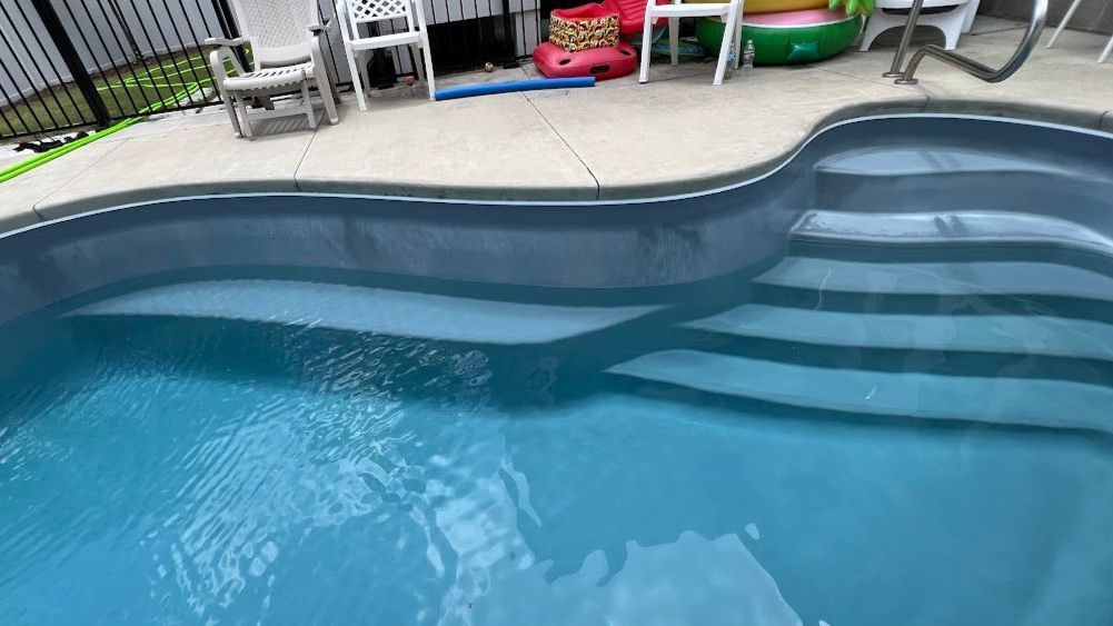 A pool with severe surface erosion due to very aggressive water with a low LSI.