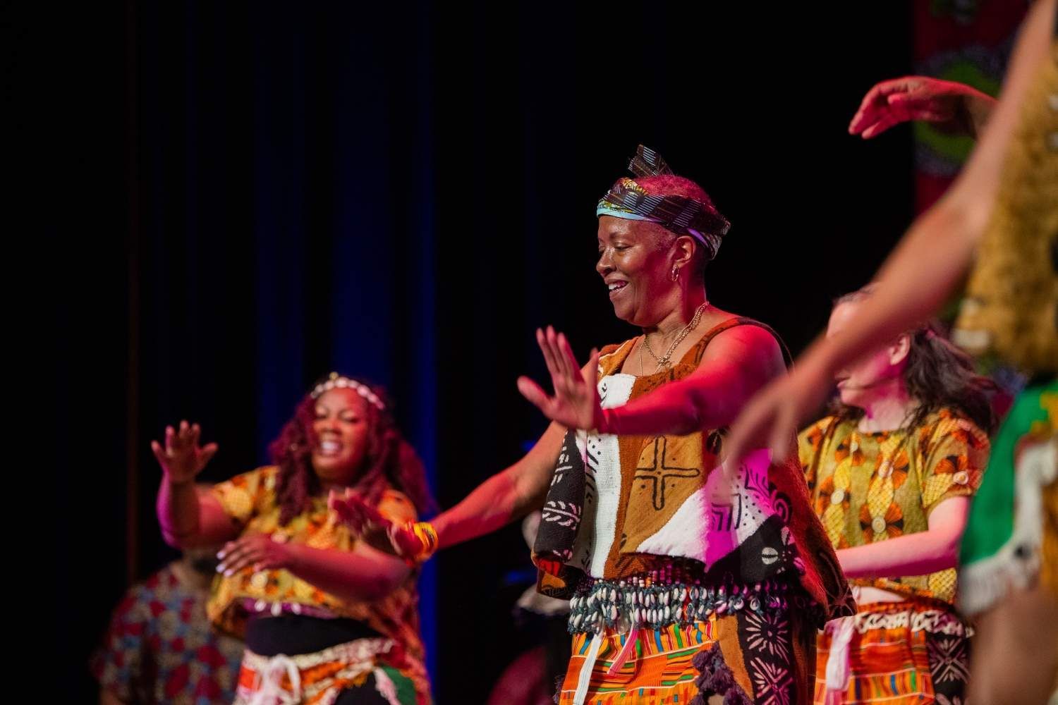 Dancers in colorful African attire