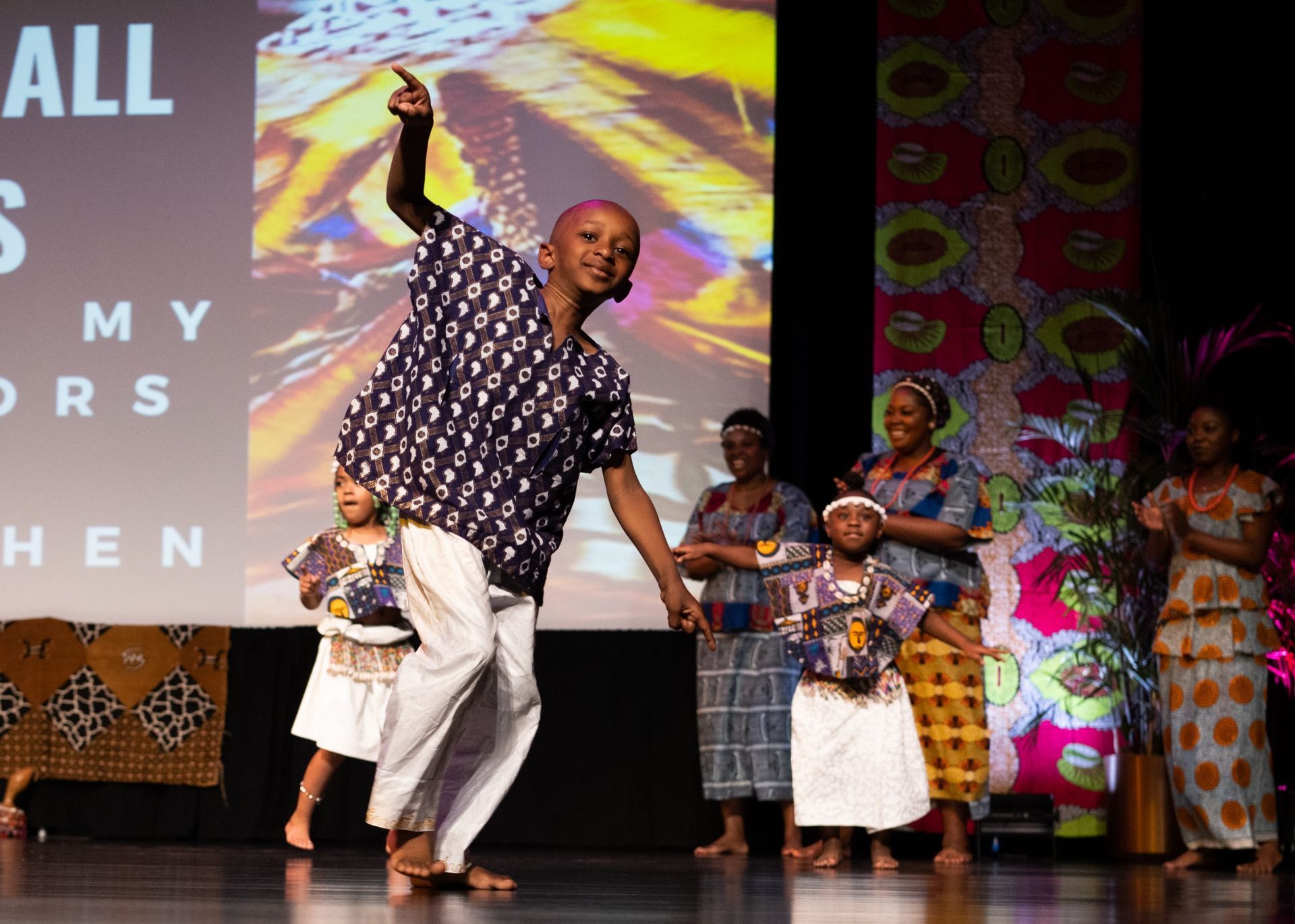 A boy dances onstage