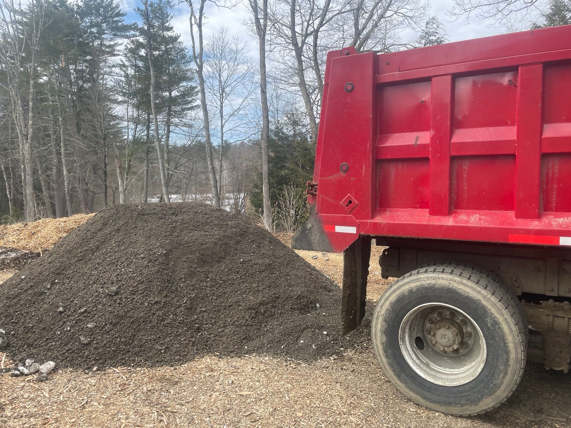 Pile of dark, rich compost ready for gardening