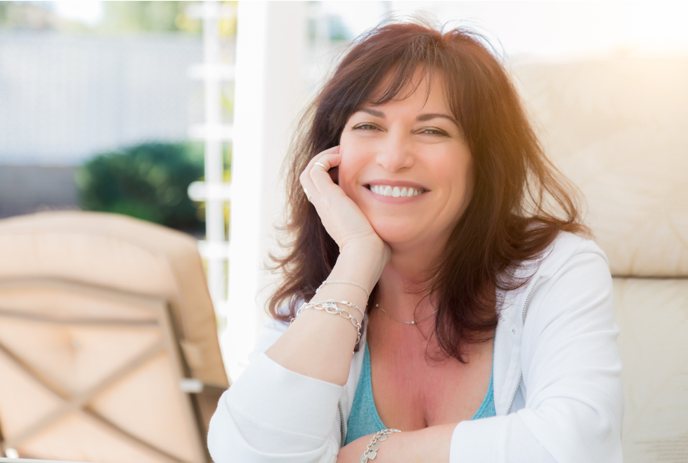 Joyful Female Hormone Replacement Therapy patient from Chronos Body Health & Wellness